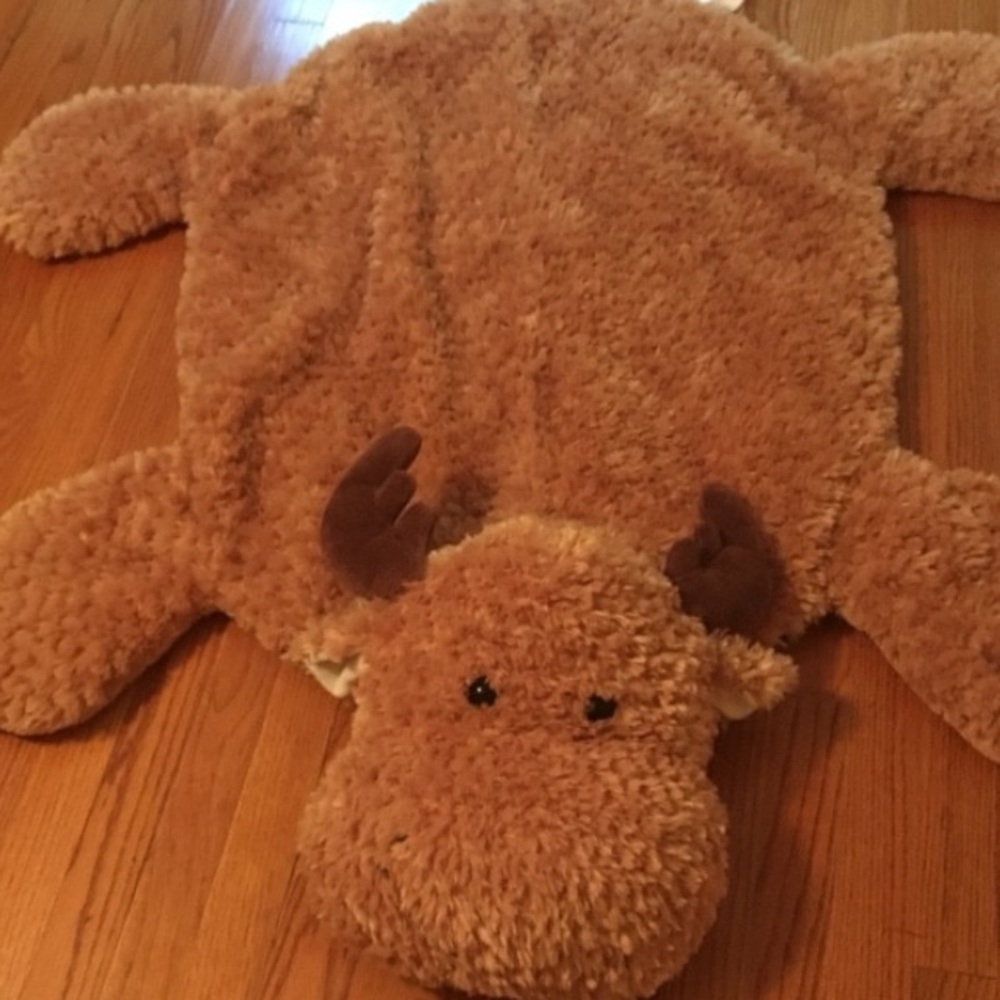 Large stuffed animal floor covering